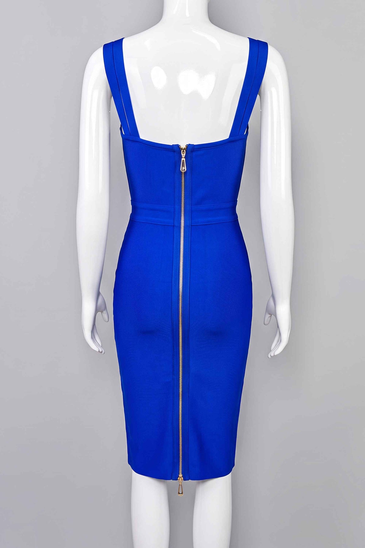 Woman wearing a figure flattering Kate Bandage Dress - Royal Blue Bodycon Collection