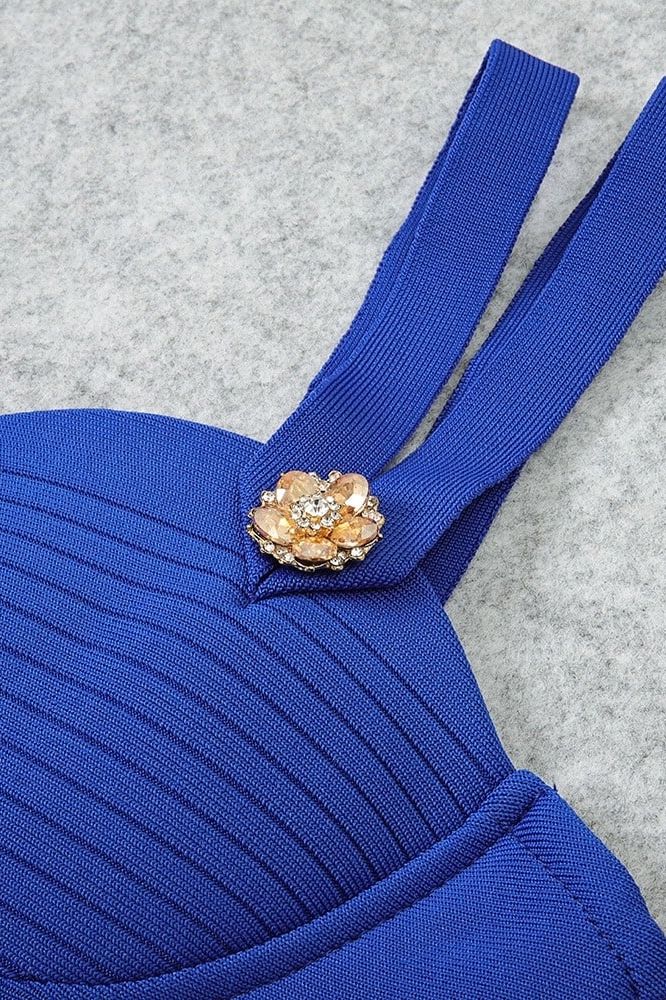 Woman wearing a figure flattering Kate Bandage Dress - Royal Blue Bodycon Collection