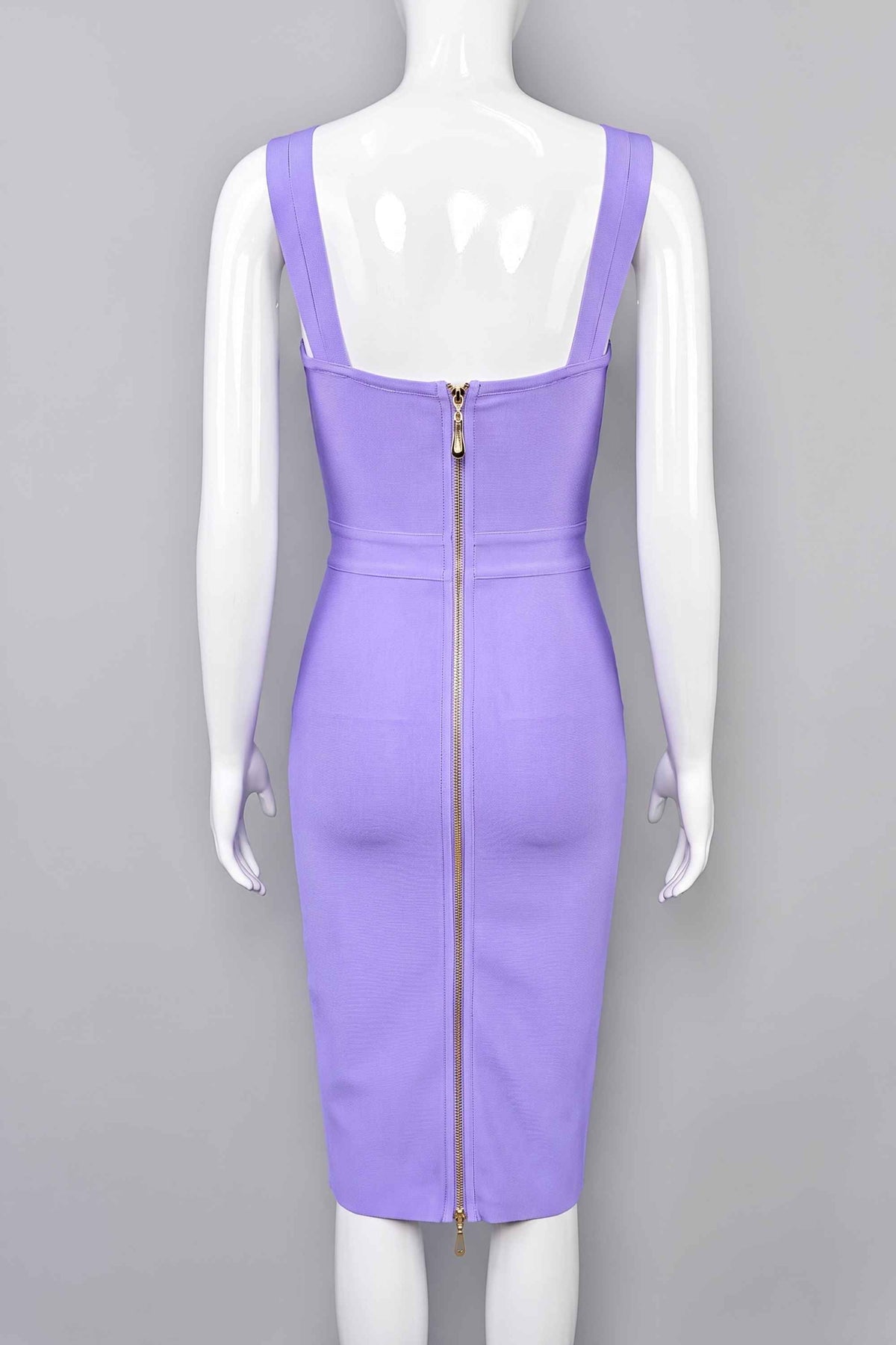Woman wearing a figure flattering Kate Bandage Dress - Violet Bodycon Collection