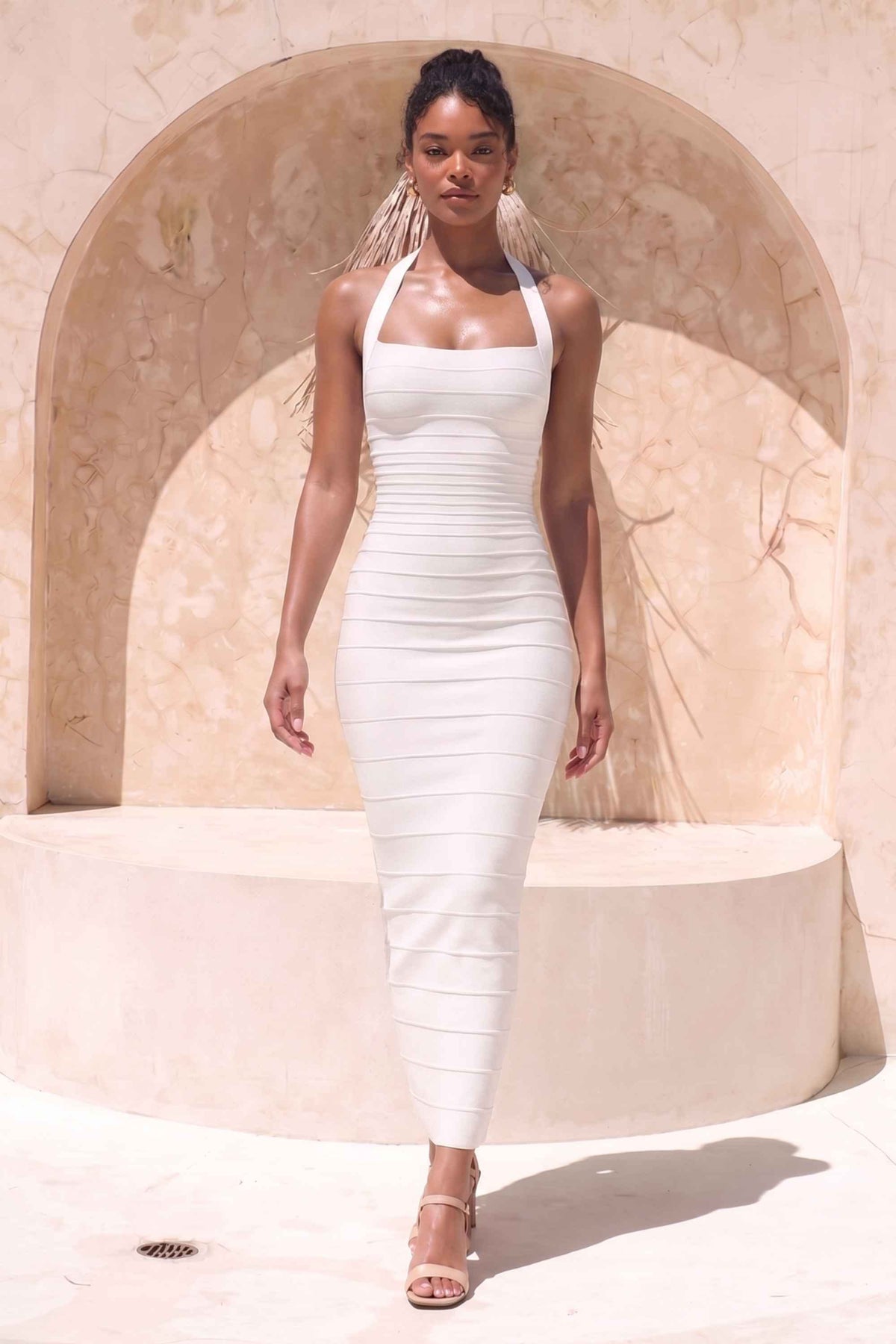 Woman wearing a figure flattering Kia Bandage Maxi Dress - White Pearl BODYCON COLLECTION Pty Ltd