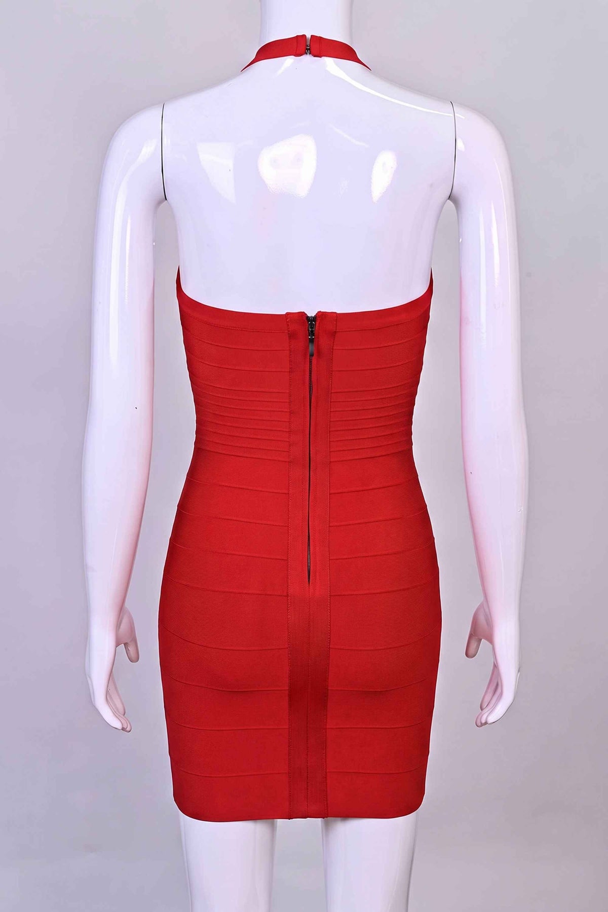 Woman wearing a figure flattering Kia Bandage Mini Dress - Lipstick Red BODYCON COLLECTION Pty Ltd