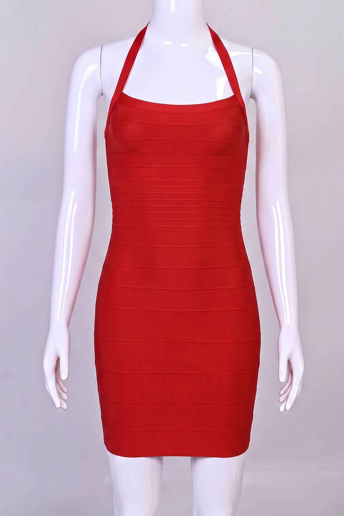 Woman wearing a figure flattering Kia Bandage Mini Dress - Lipstick Red BODYCON COLLECTION Pty Ltd