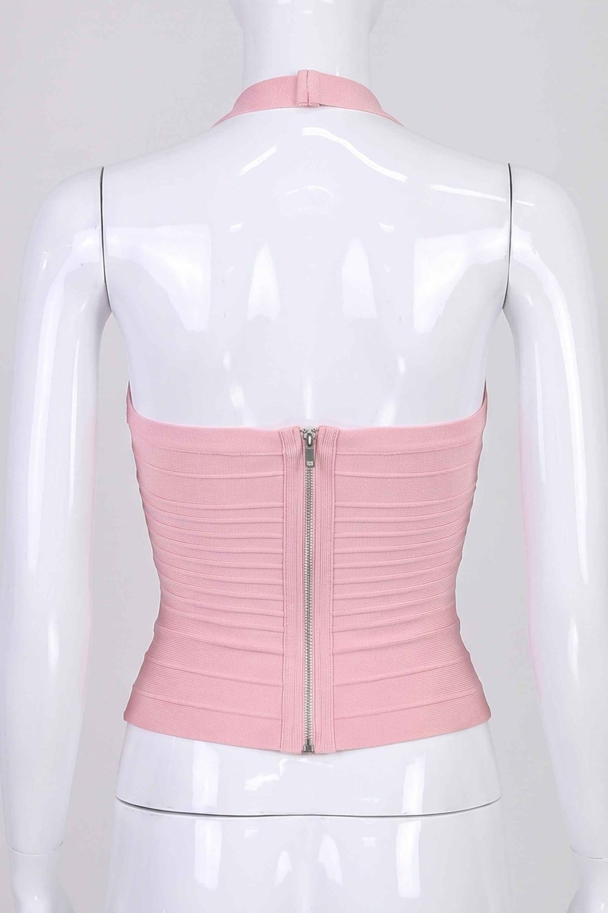 Woman wearing a figure flattering Kia Bandage Top - Dusty Pink BODYCON COLLECTION Pty Ltd