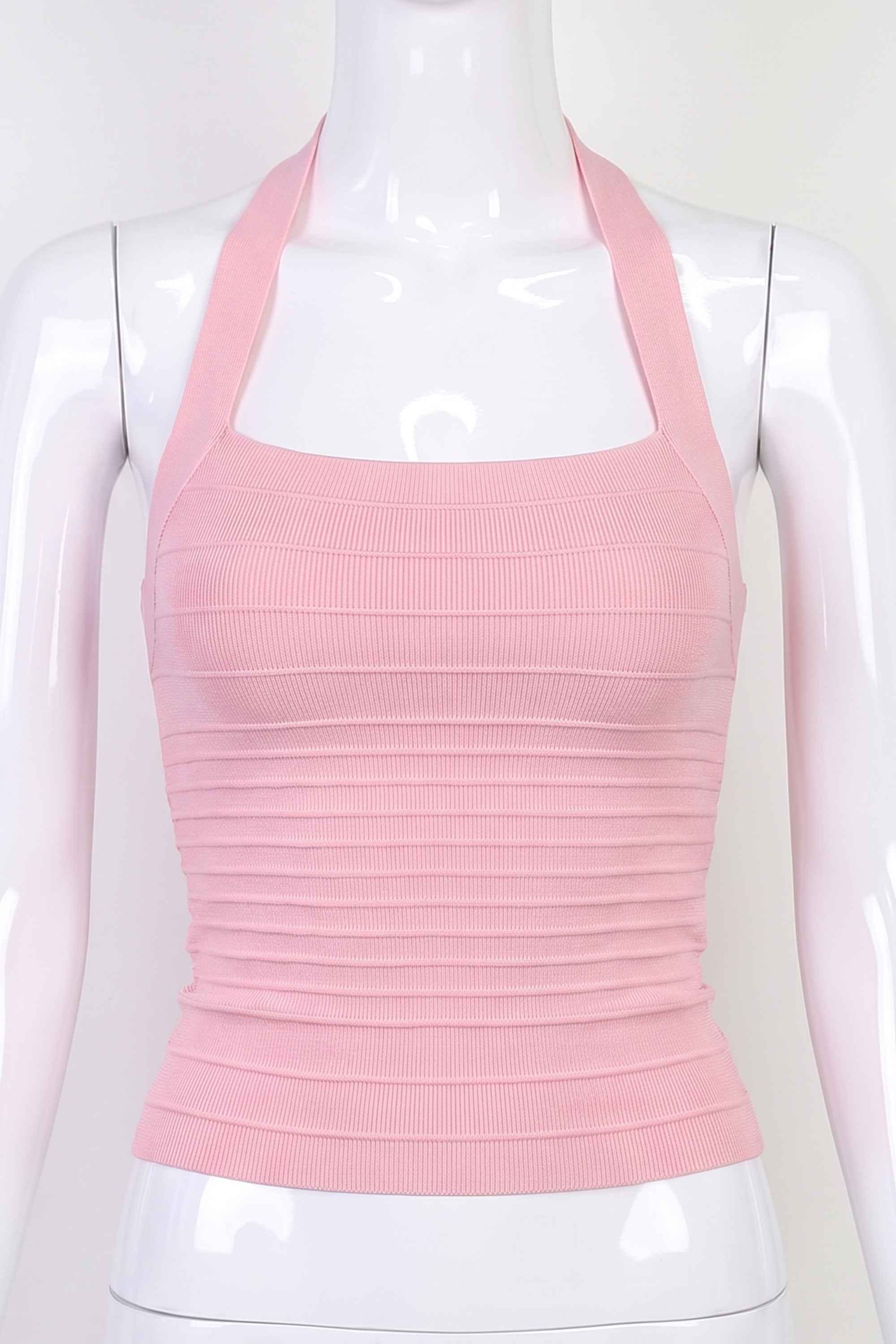 Woman wearing a figure flattering Kia Bandage Top - Dusty Pink BODYCON COLLECTION Pty Ltd
