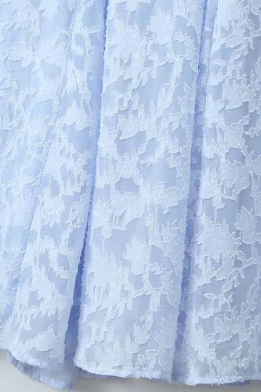 Woman wearing a figure flattering Kora Bodycon Maxi Dress - Baby Blue BODYCON COLLECTION