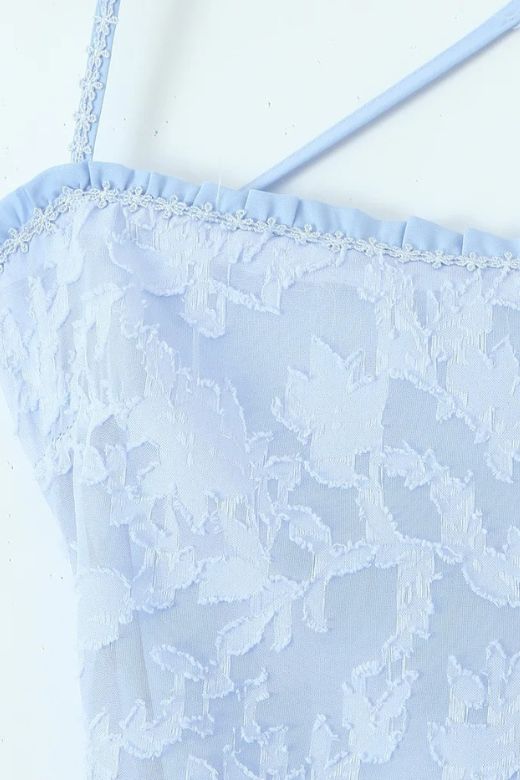 Woman wearing a figure flattering Kora Bodycon Maxi Dress - Baby Blue BODYCON COLLECTION