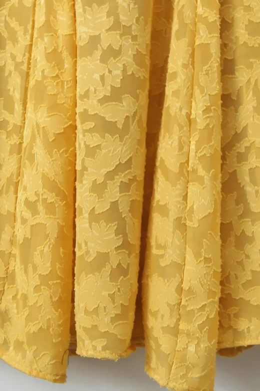 Woman wearing a figure flattering Kora Bodycon Maxi Dress - Lemon Yellow BODYCON COLLECTION