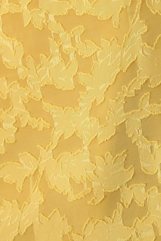 Woman wearing a figure flattering Kora Bodycon Maxi Dress - Lemon Yellow BODYCON COLLECTION