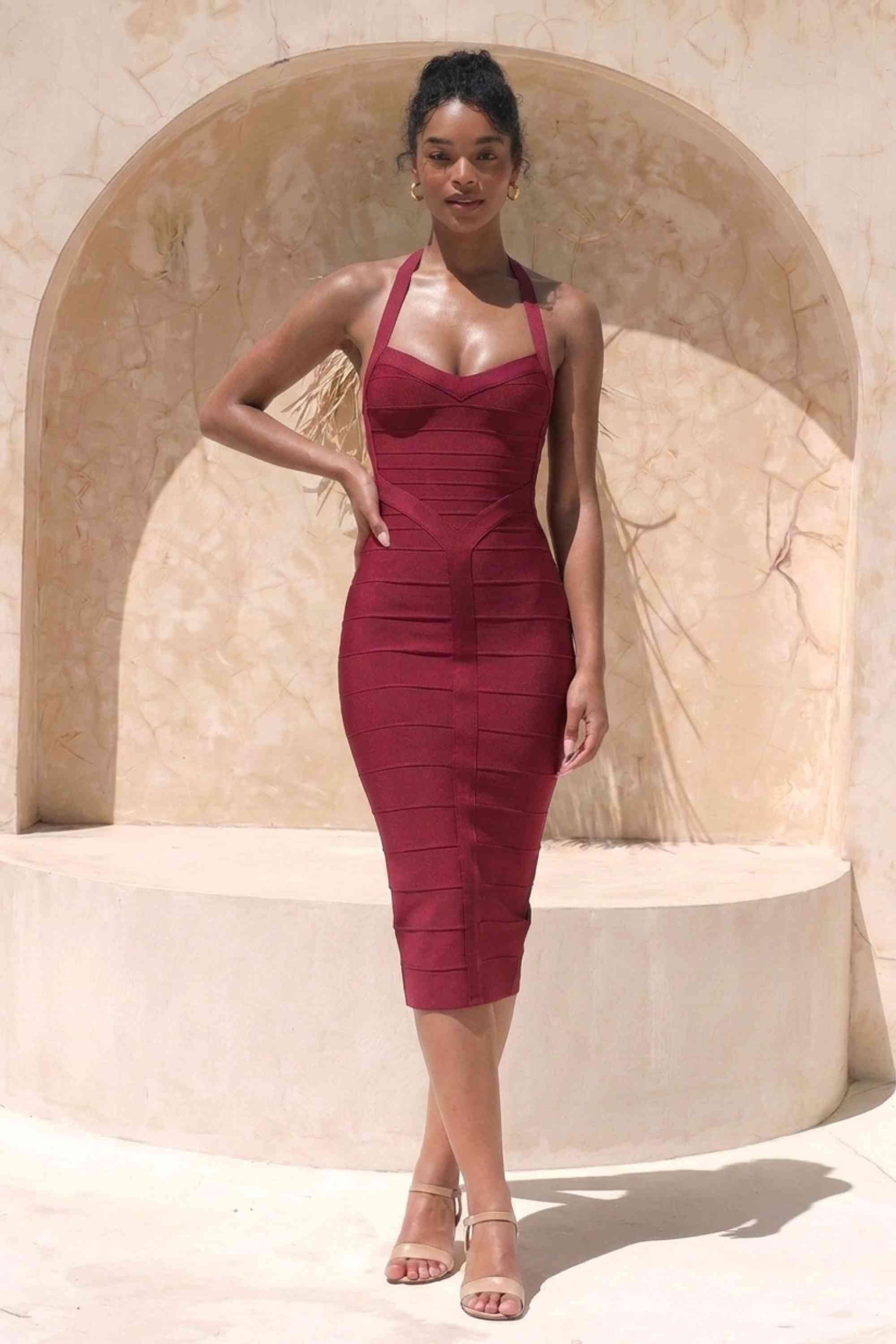 Woman wearing a figure flattering Lara Bandage Midi Dress - Red Wine BODYCON COLLECTION Pty Ltd