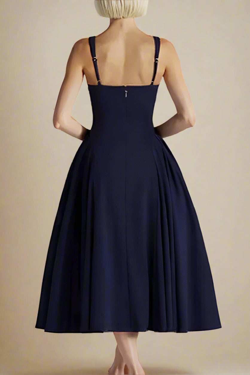 Woman wearing a figure flattering Layne Bodycon Midi Dress - Navy Blue BODYCON COLLECTION Pty Ltd
