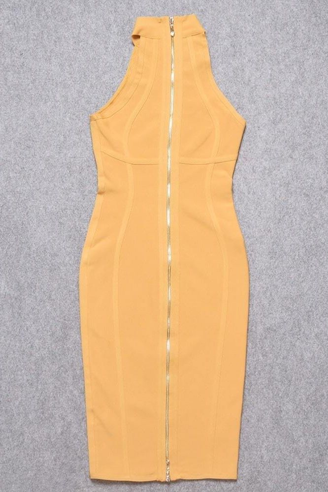 Woman wearing a figure flattering Lea Bandage Midi Dress - Mustard Yellow Bodycon Collection