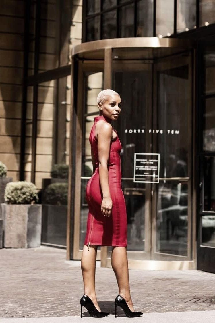 Woman wearing a figure flattering Lea Bandage Midi Dress - Nude Bodycon Collection