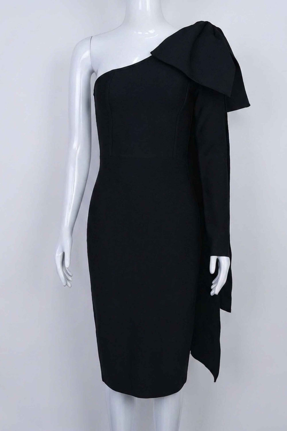Woman wearing a figure flattering Lela Long Sleeve Bandage Midi Dress - Classic Black BODYCON COLLECTION
