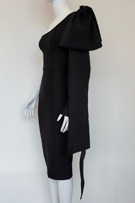 Woman wearing a figure flattering Lela Long Sleeve Bandage Midi Dress - Classic Black BODYCON COLLECTION