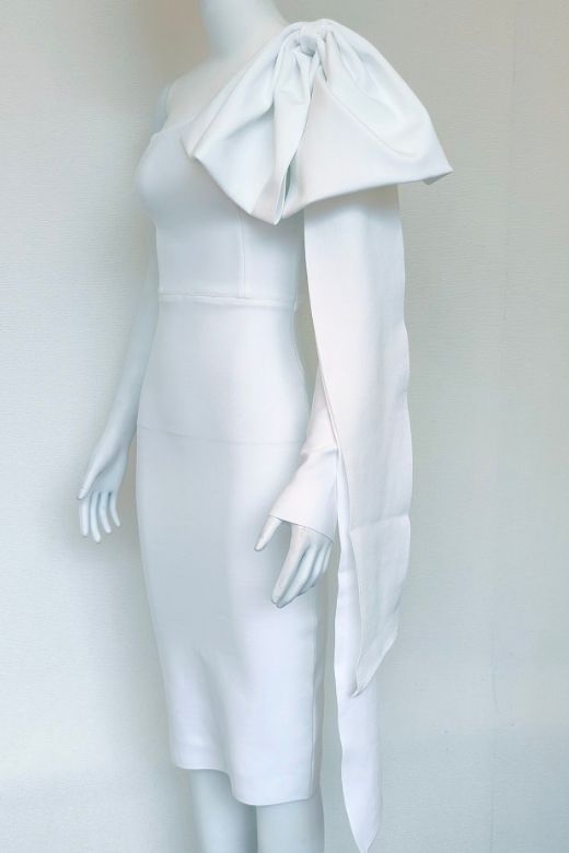 Woman wearing a figure flattering Lela Long Sleeve Bandage Midi Dress - White Pearl BODYCON COLLECTION