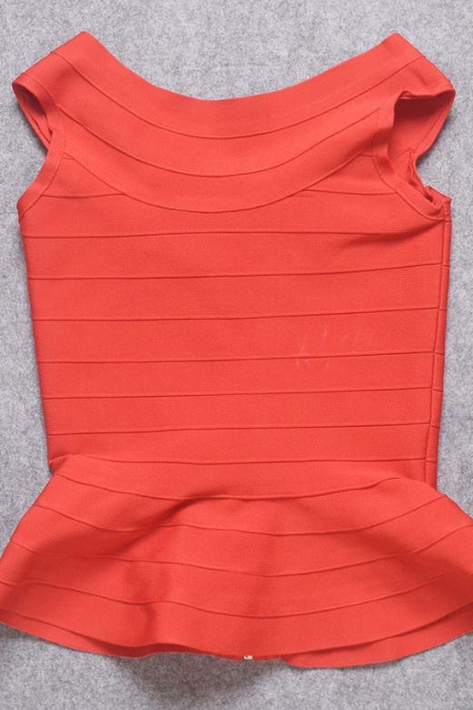 Woman wearing a figure flattering Leni Bandage Top - Lipstick Red BODYCON COLLECTION