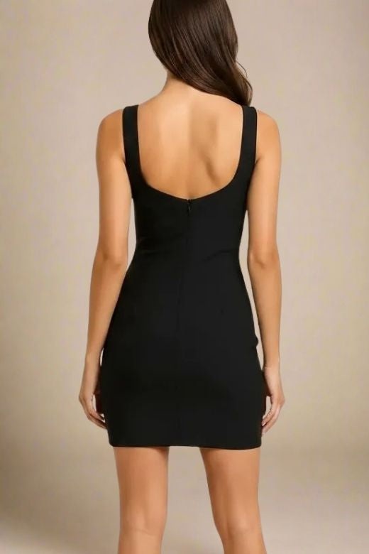 Woman wearing a figure flattering Livia Bodycon Mini Dress - Classic Black BODYCON COLLECTION Pty Ltd
