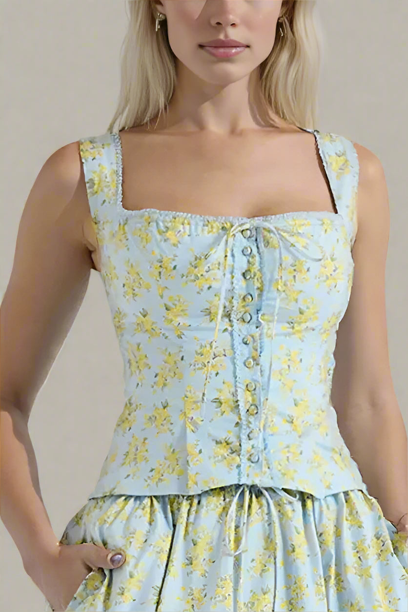Woman wearing a figure flattering Livia Top - Sky Blue BODYCON COLLECTION Pty Ltd
