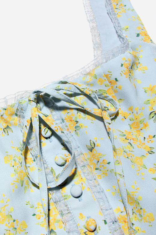 Woman wearing a figure flattering Livia Top - Sky Blue BODYCON COLLECTION Pty Ltd