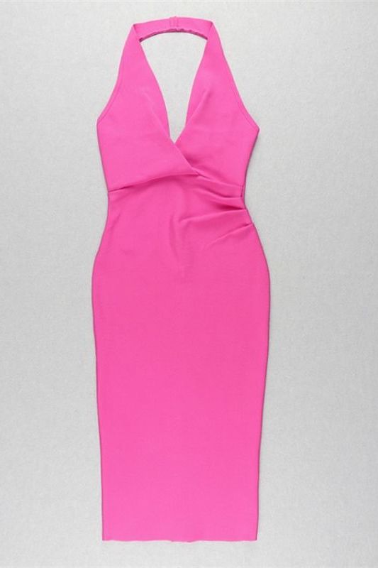 Woman wearing a figure flattering London Bandage Dress - Hot Pink BODYCON COLLECTION