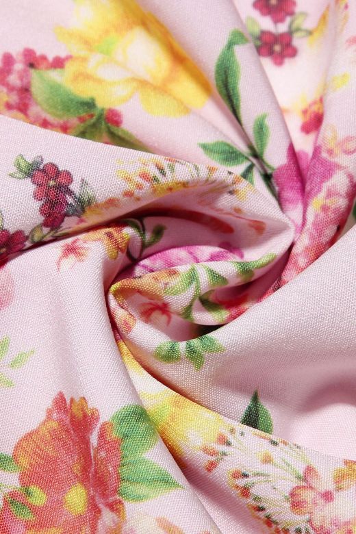 Woman wearing a figure flattering Lynsie Bodycon Midi Dress - Dusty Pink BODYCON COLLECTION