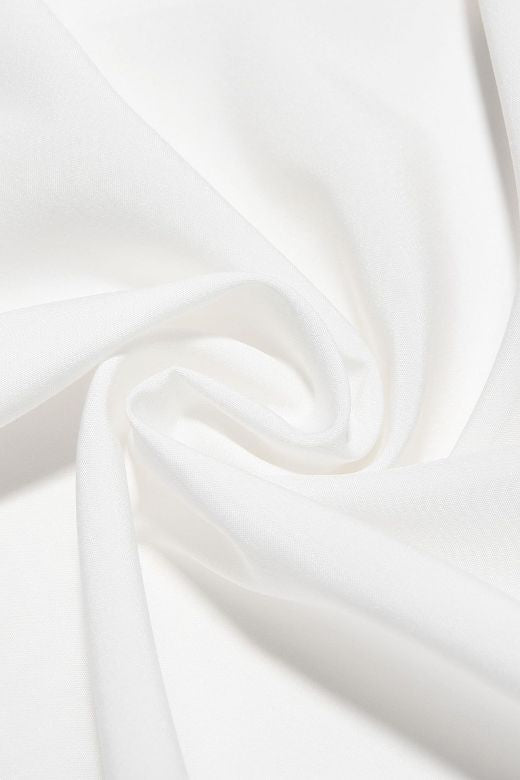 Woman wearing a figure flattering Lynsie Bodycon Midi Dress - Pearl White BODYCON COLLECTION