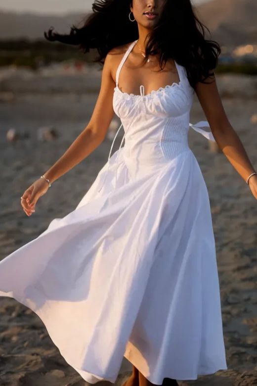 Woman wearing a figure flattering Lynsie Bodycon Midi Dress - Pearl White BODYCON COLLECTION