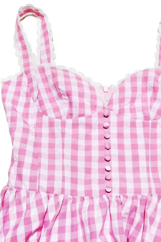 Woman wearing a figure flattering Mari Bodycon Mini Dress - Blush Pink BODYCON COLLECTION