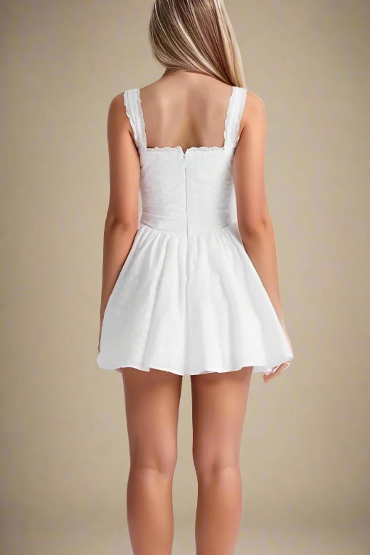 Woman wearing a figure flattering Mari Bodycon Mini Dress - Pearl White BODYCON COLLECTION