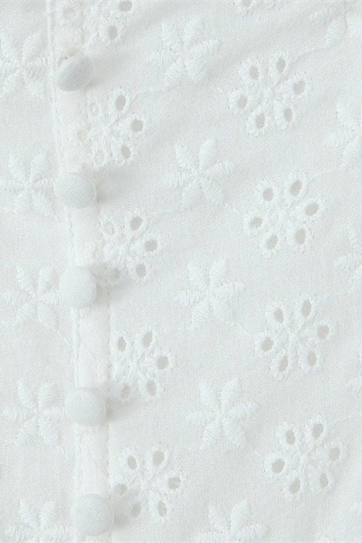 Woman wearing a figure flattering Mari Bodycon Mini Dress - Pearl White BODYCON COLLECTION