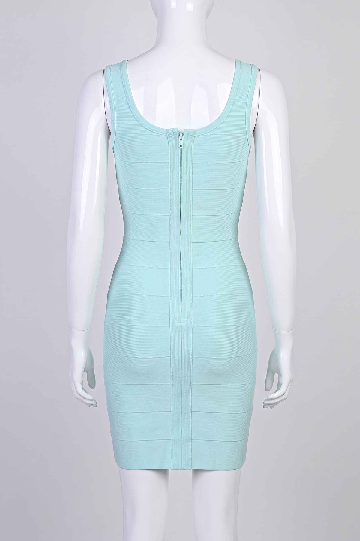 Woman wearing a figure flattering Maria Bandage Mini Dress - Baby Blue BODYCON COLLECTION