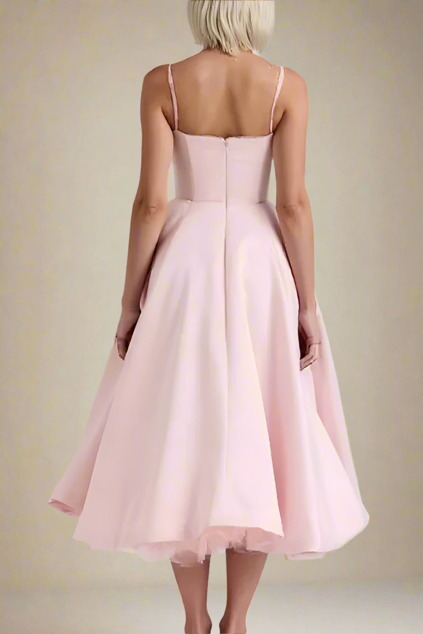 Woman wearing a figure flattering Mavis Bodycon Midi Dress - Dusty Pink BODYCON COLLECTION