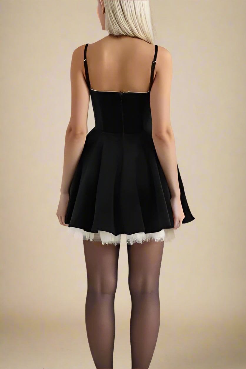 Woman wearing a figure flattering Mavis Bodycon Mini Dress - Velvet Black BODYCON COLLECTION