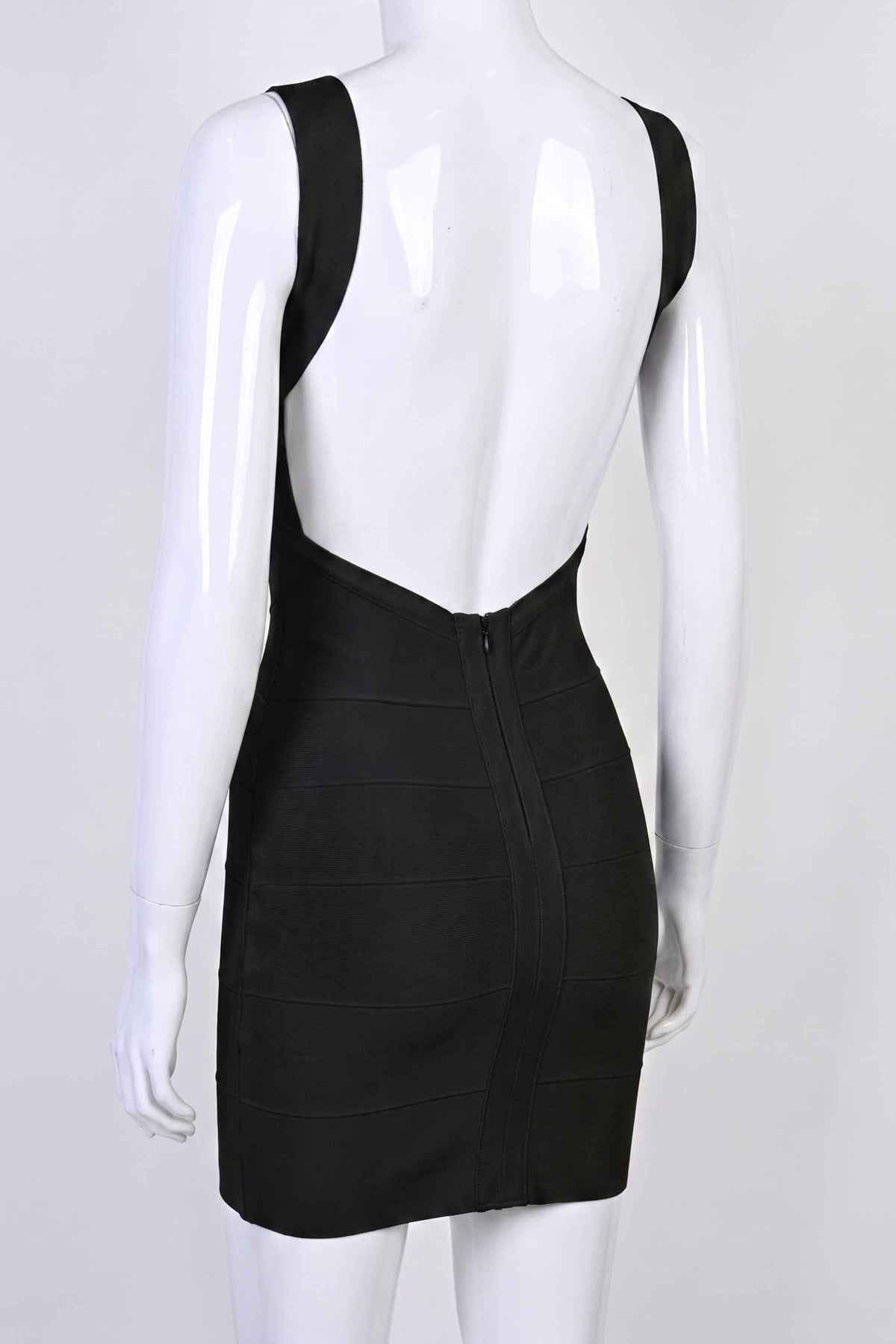 Woman wearing a figure flattering Maya Bandage Mini Dress - Classic Black BODYCON COLLECTION