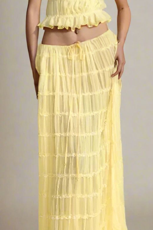 Woman wearing a figure flattering  Meryl Wrap Top and Maxi Skirt Set - Butter Yellow BODYCON COLLECTION