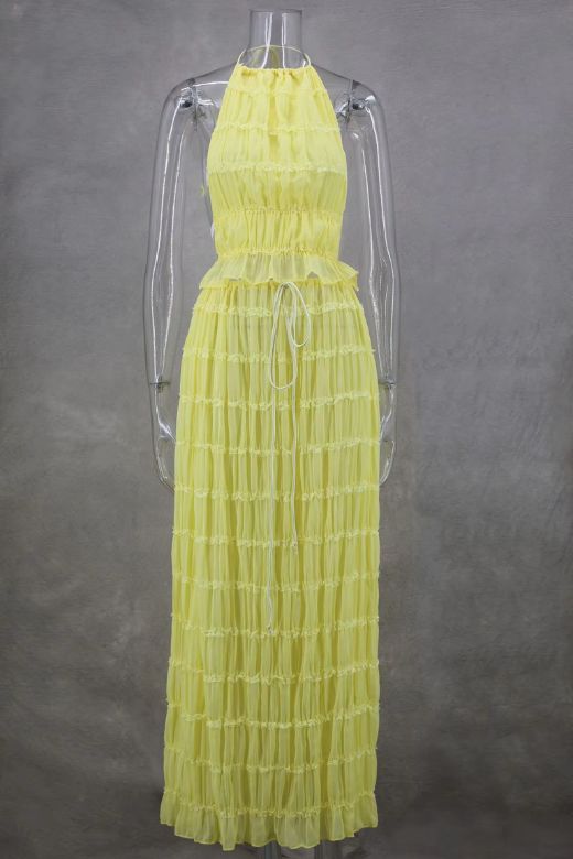 Woman wearing a figure flattering  Meryl Wrap Top and Maxi Skirt Set - Butter Yellow BODYCON COLLECTION