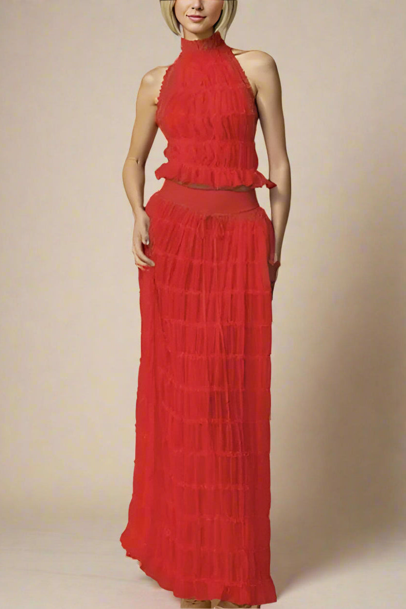 Woman wearing a figure flattering Meryl Wrap Top and Maxi Skirt Set - Chilli Red BODYCON COLLECTION