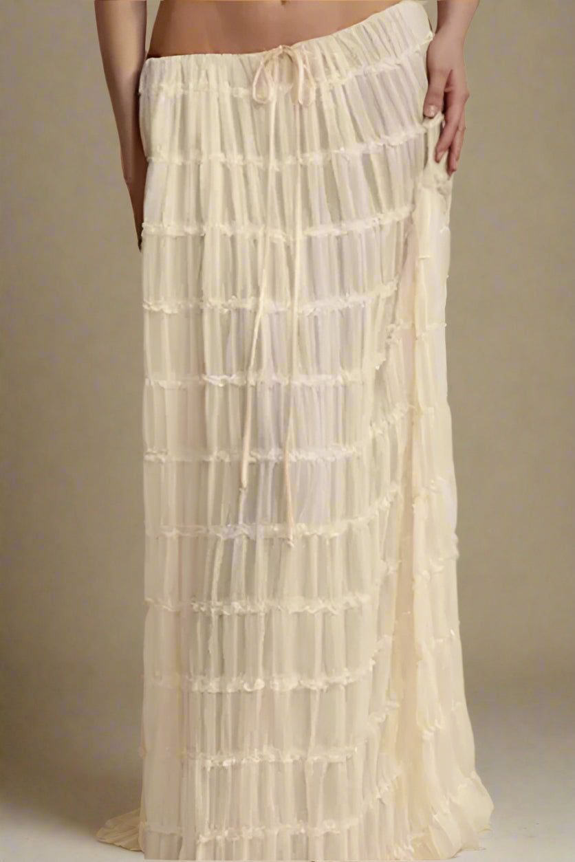 Woman wearing a figure flattering  Meryl Wrap Top and Maxi Skirt Set - Cream BODYCON COLLECTION