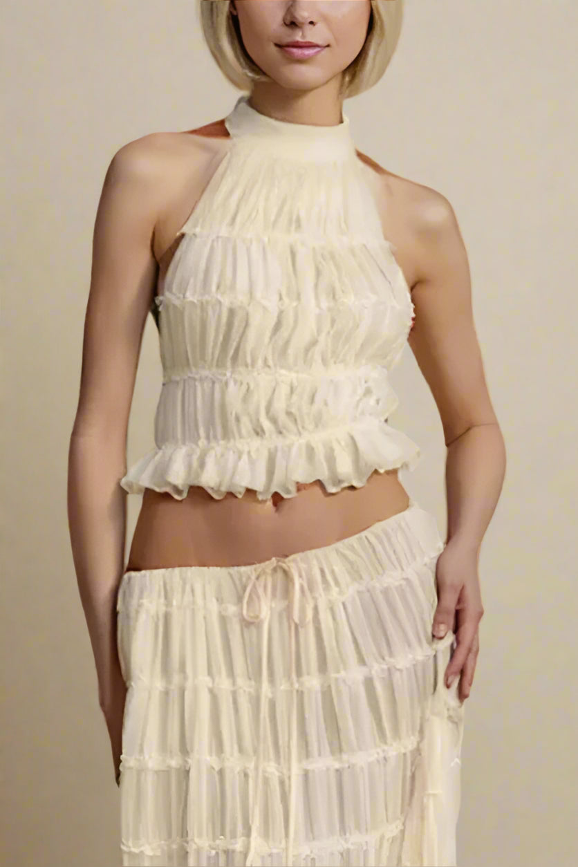 Woman wearing a figure flattering Meryl Wrap Top and Maxi Skirt Set - Cream BODYCON COLLECTION
