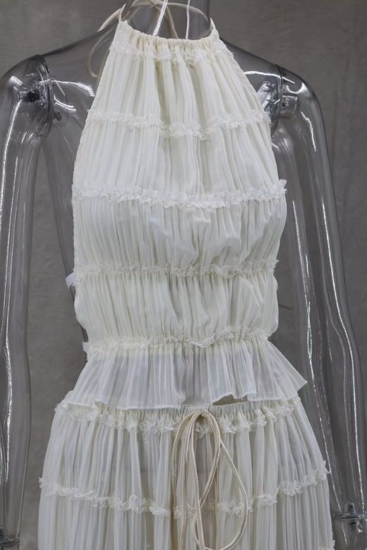 Woman wearing a figure flattering Meryl Wrap Top and Maxi Skirt Set - Cream BODYCON COLLECTION