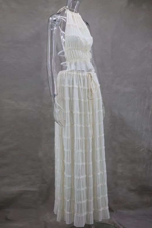 Woman wearing a figure flattering  Meryl Wrap Top and Maxi Skirt Set - Cream BODYCON COLLECTION