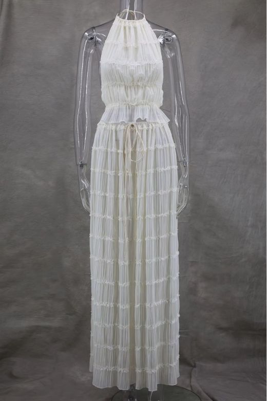 Woman wearing a figure flattering  Meryl Wrap Top and Maxi Skirt Set - Cream BODYCON COLLECTION