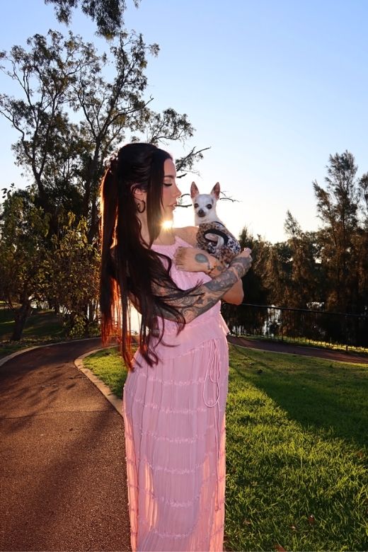 Woman wearing a figure flattering Meryl Wrap Top and Maxi Skirt Set - Cream BODYCON COLLECTION
