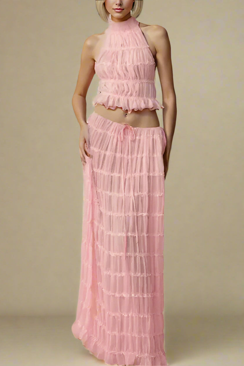 Woman wearing a figure flattering Meryl Wrap Top and Maxi Skirt Set - Pink Fuzz BODYCON COLLECTION