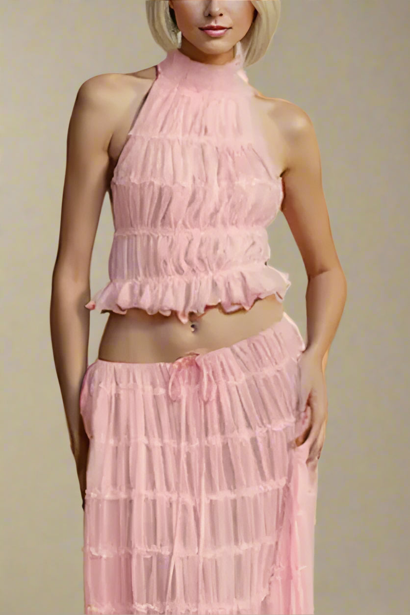 Woman wearing a figure flattering  Meryl Wrap Top and Maxi Skirt Set - Pink Fuzz BODYCON COLLECTION