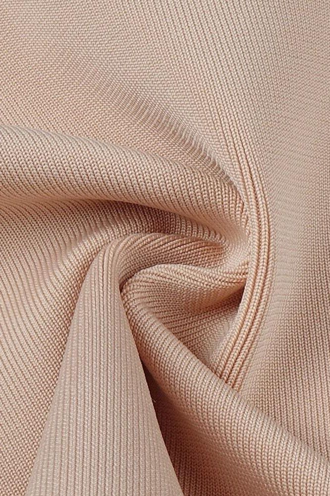 Woman wearing a figure flattering Milan Bandage Midi Dress - Nude BODYCON COLLECTION