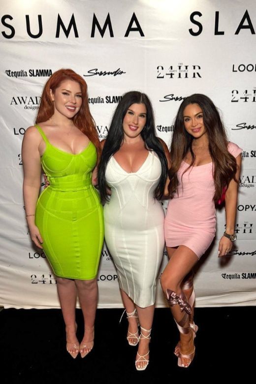 Woman wearing a figure flattering Miranda Bandage Mini Dress - Dusty Pink Bodycon Collection