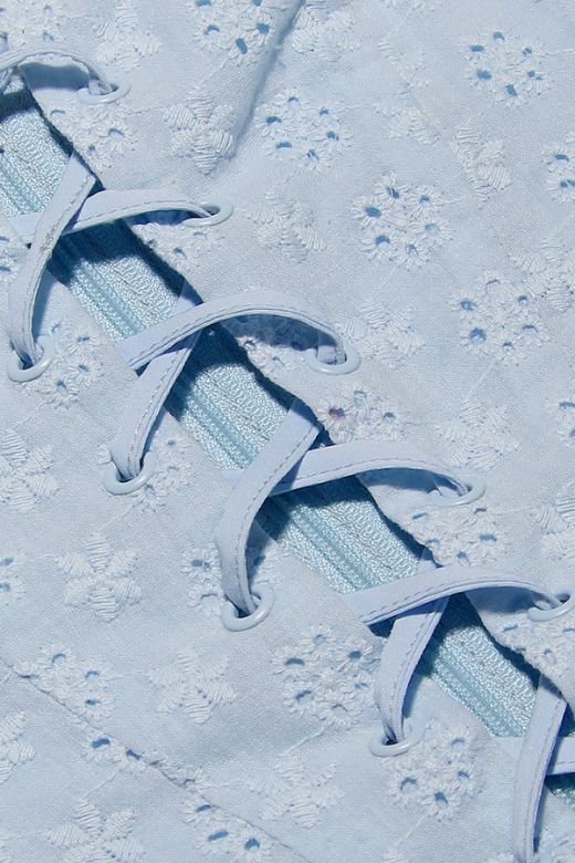 Woman wearing a figure flattering Misty Bodycon Mini Dress - Baby Blue BODYCON COLLECTION