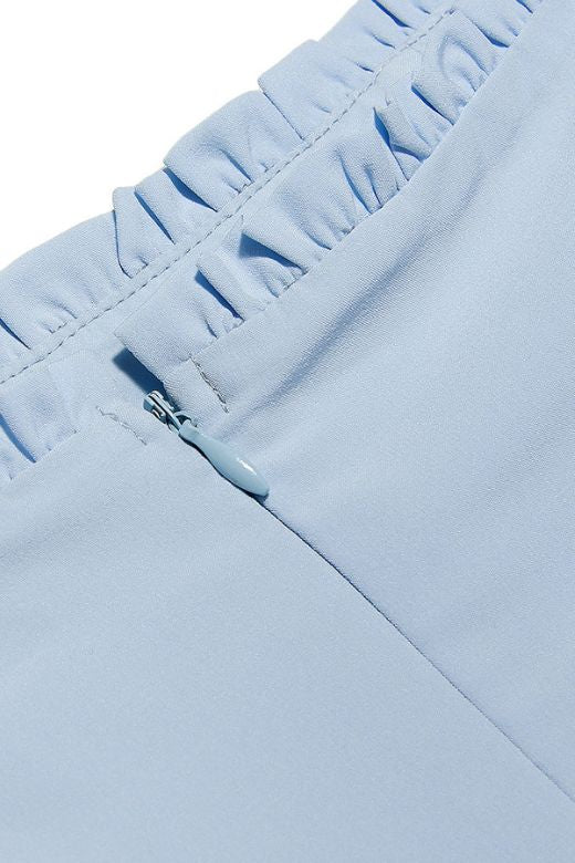 Woman wearing a figure flattering Misty Bodycon Mini Dress - Baby Blue BODYCON COLLECTION