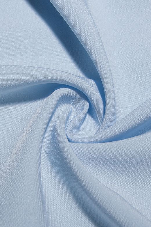 Woman wearing a figure flattering Misty Bodycon Mini Dress - Baby Blue BODYCON COLLECTION